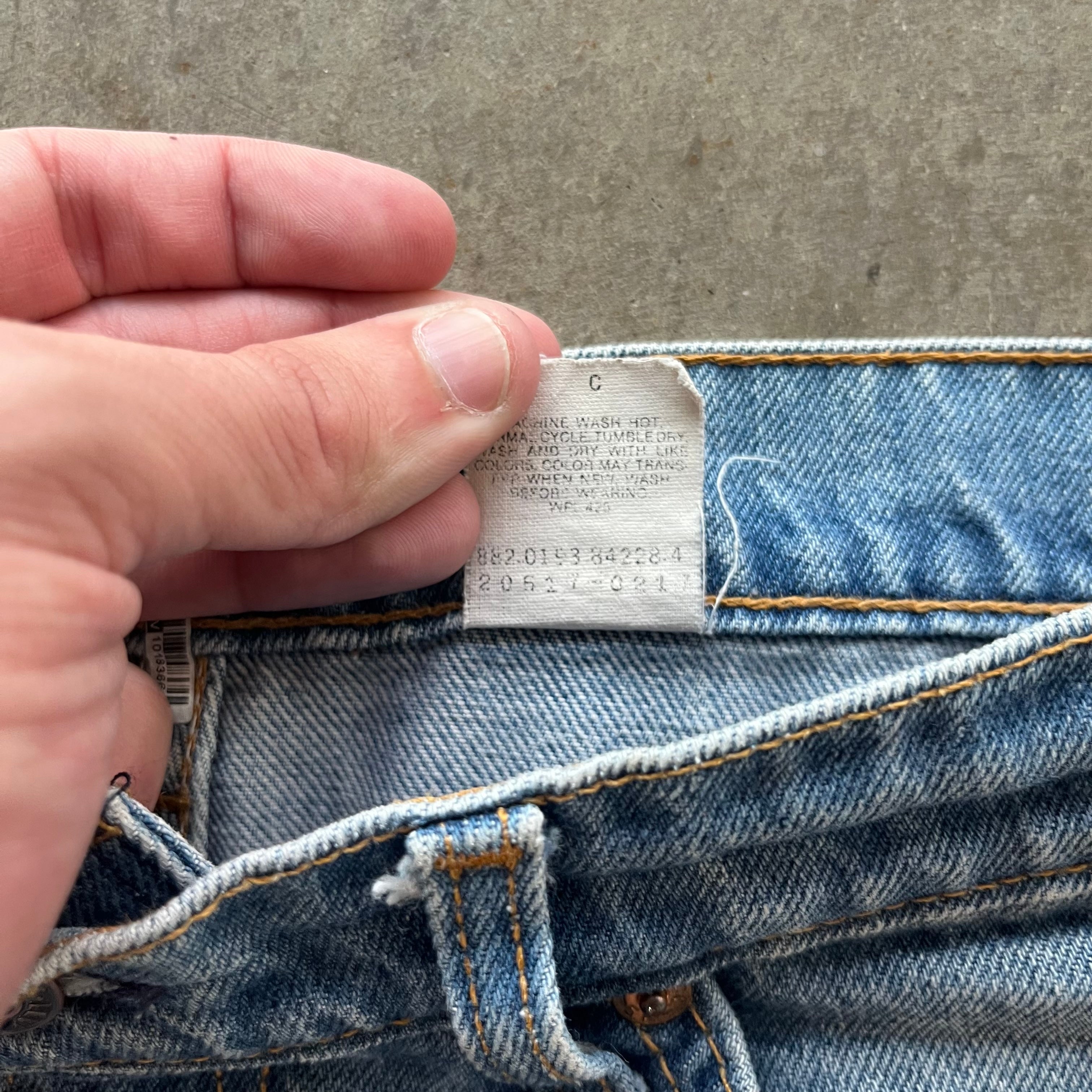 34x34 90s Faded Orange Tab Levis 517