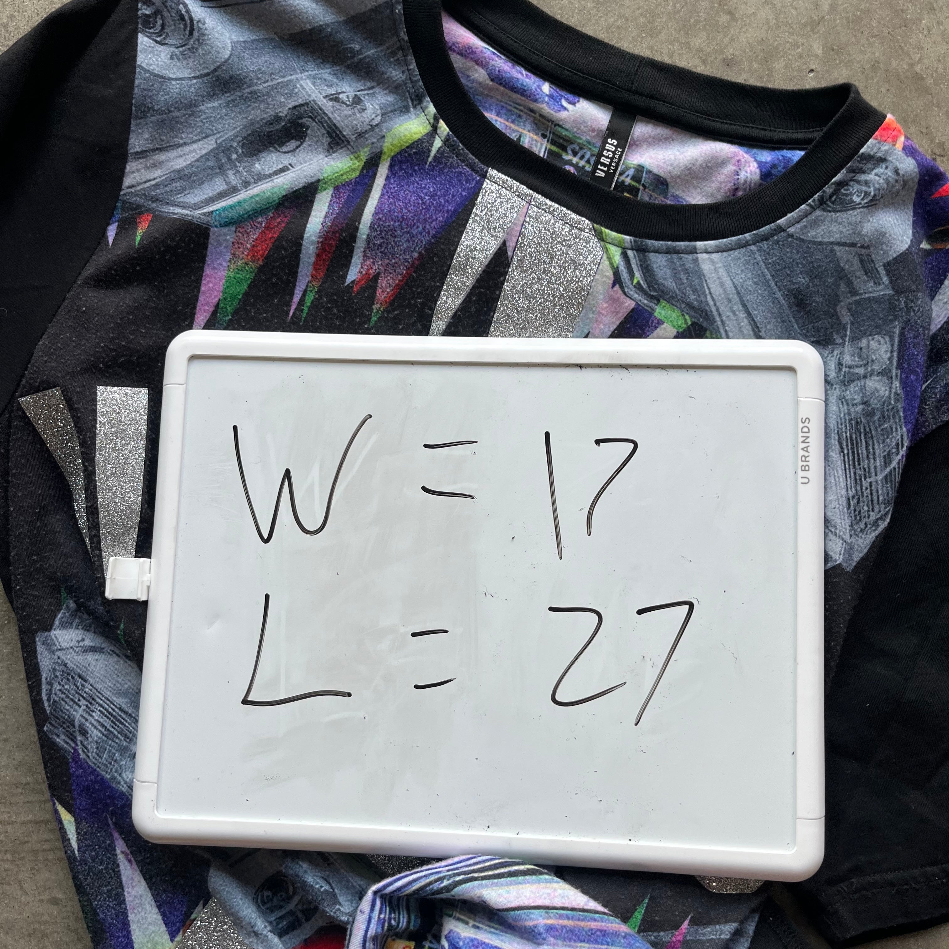 L Versace versus Tee