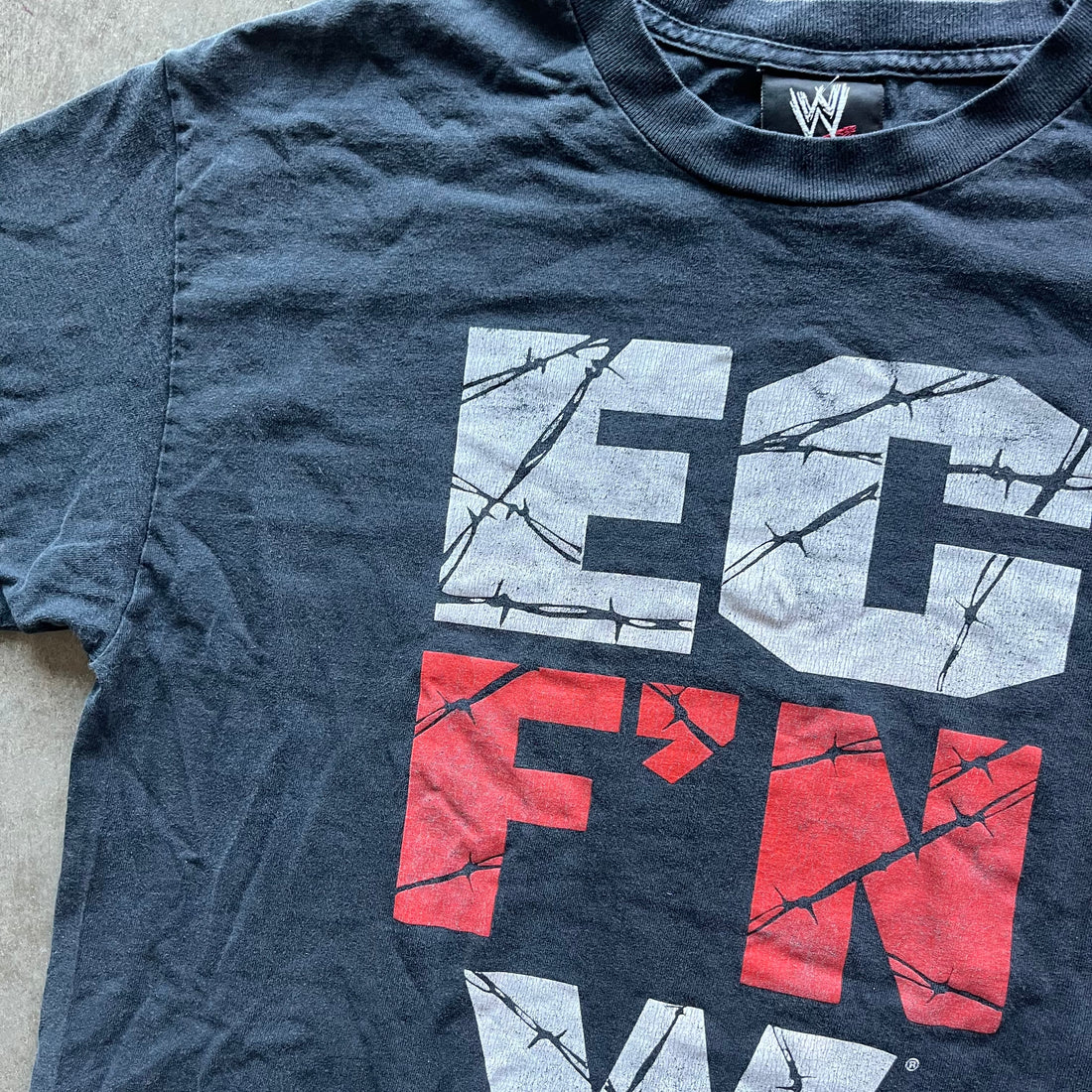 L 02 WWE Tee