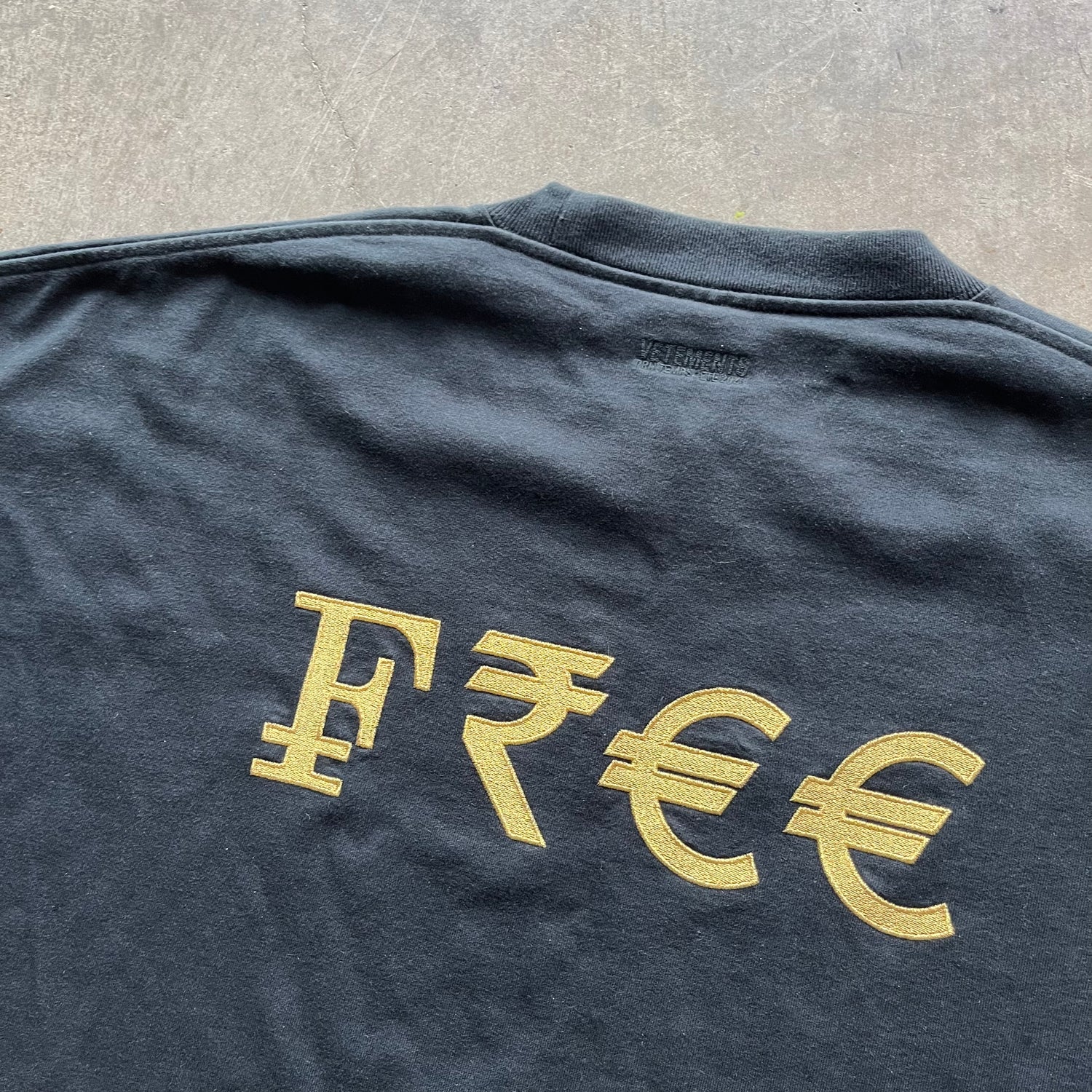 L Vetements Capitalism Tee