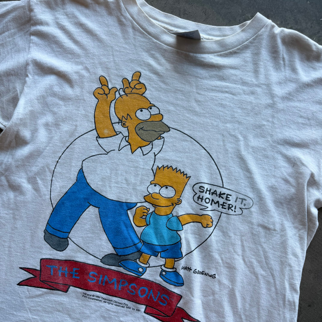 L 1990 Simpson Tee