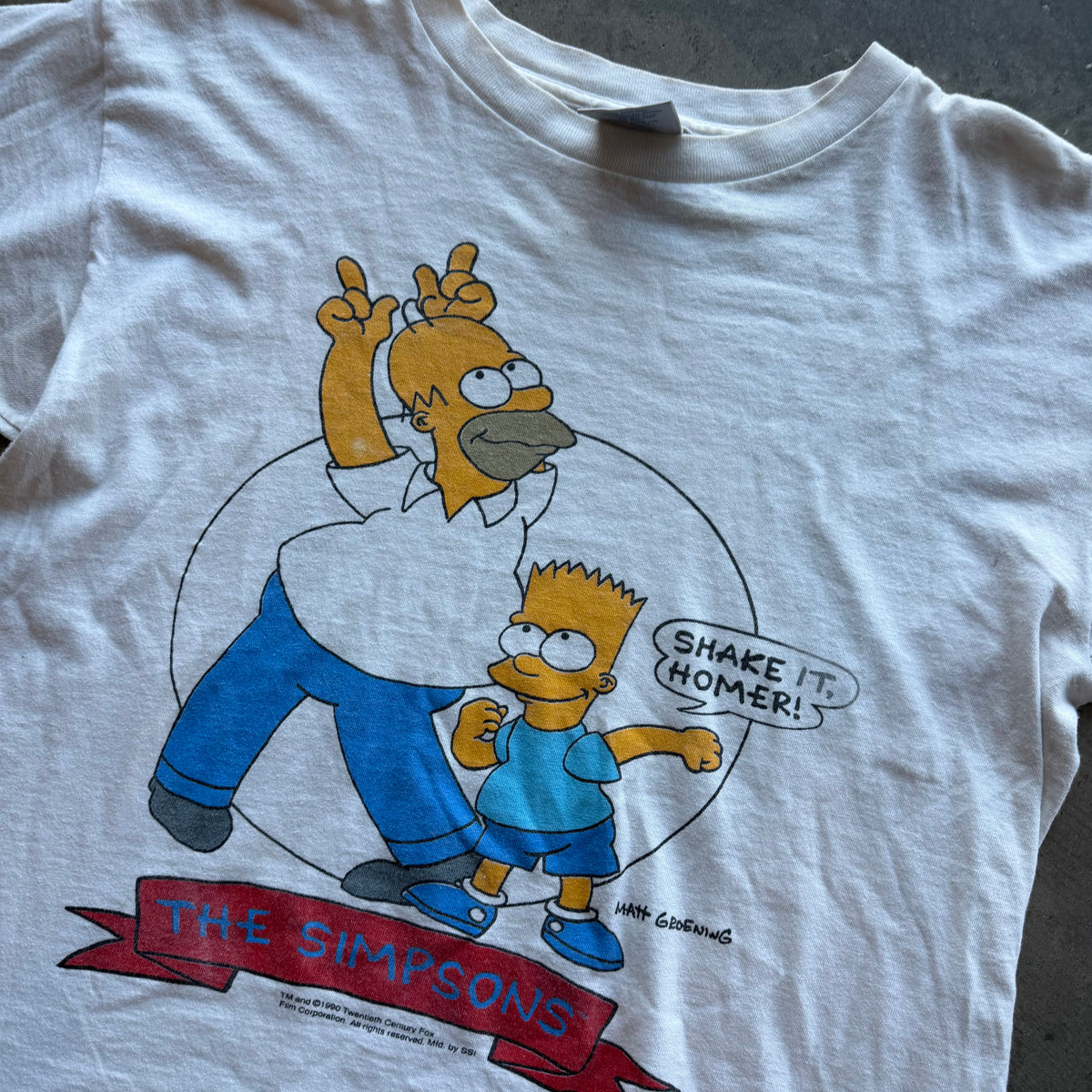 L 1990 Simpson Tee