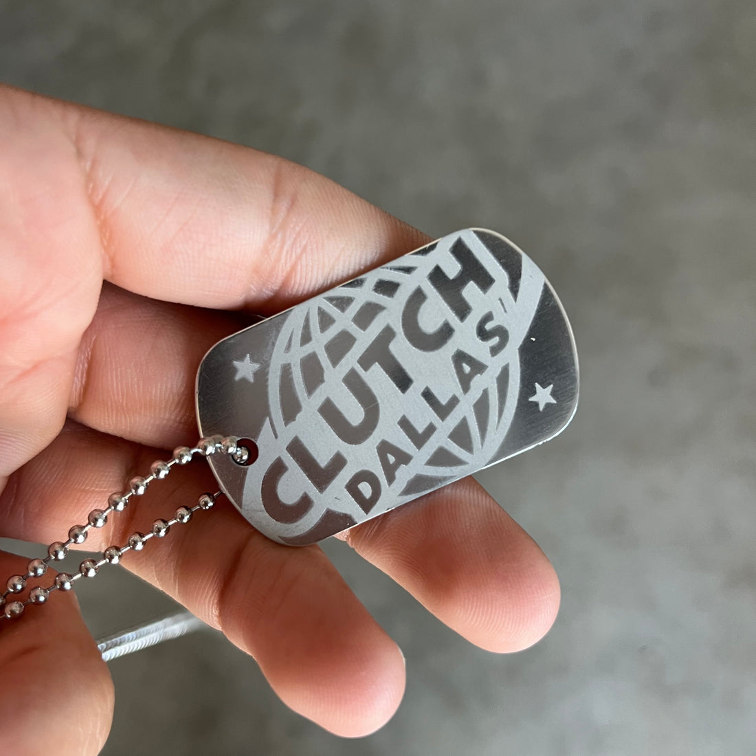 Clutch Worldwide Dog Tag