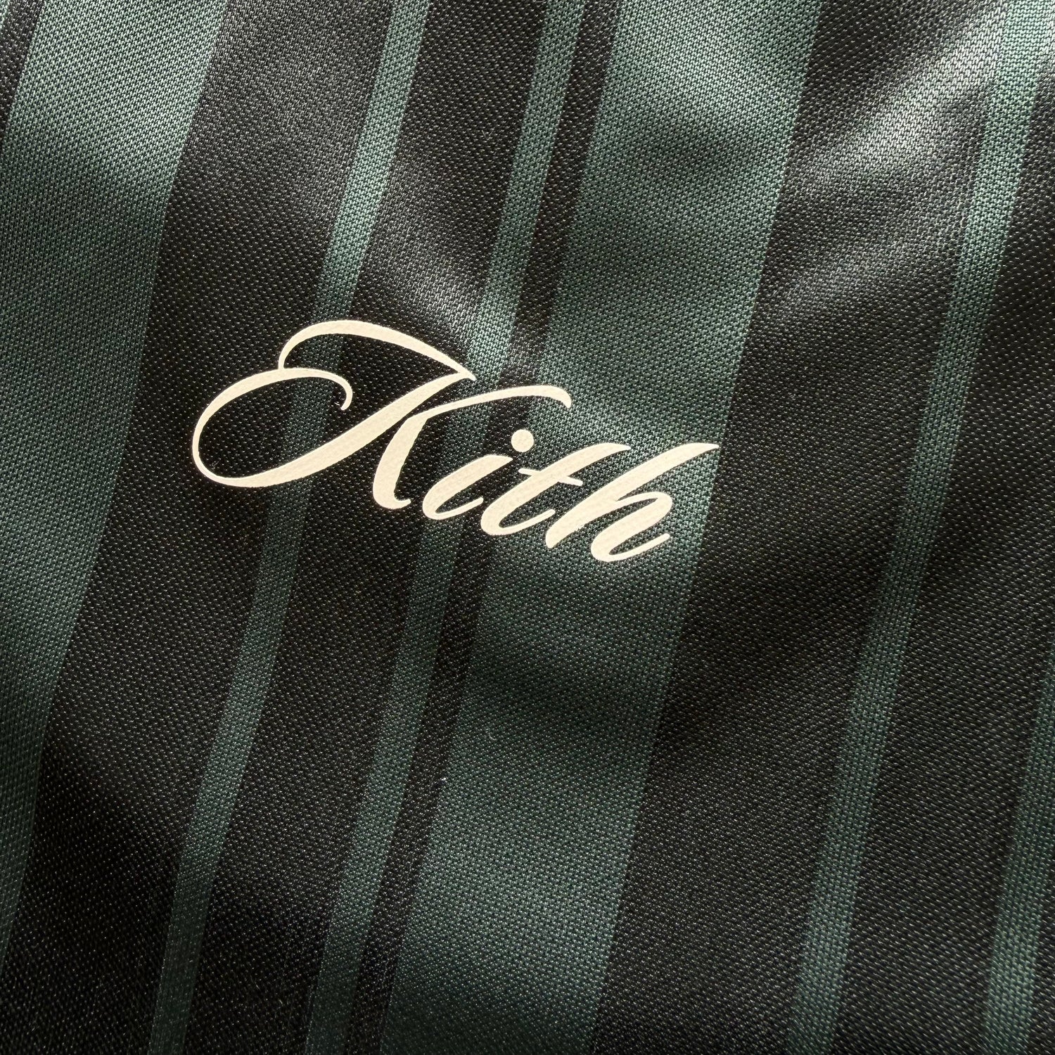 M Kith Pinstripe Tricot L/S Tap in Polo Green