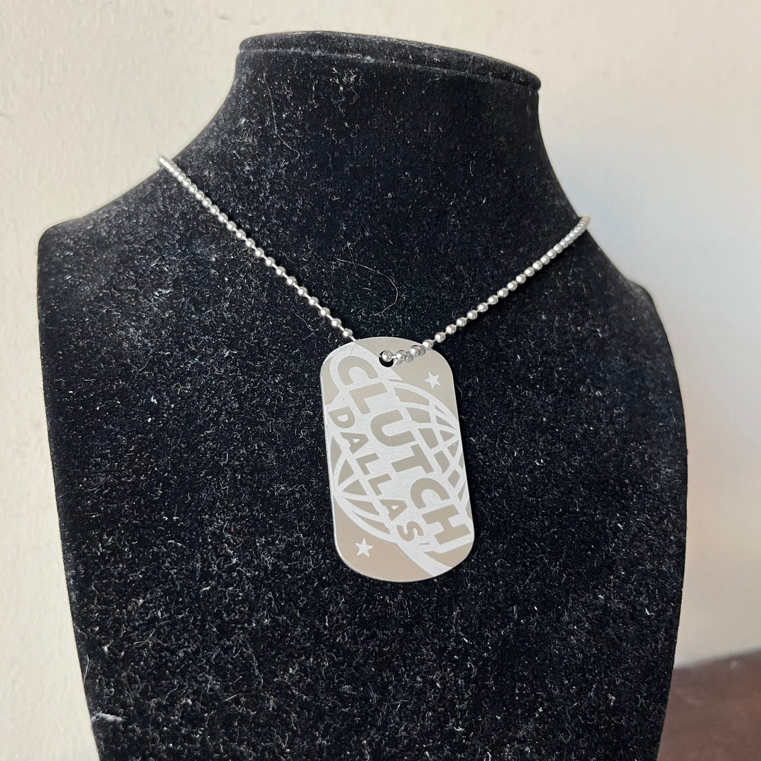 Clutch Worldwide Dog Tag
