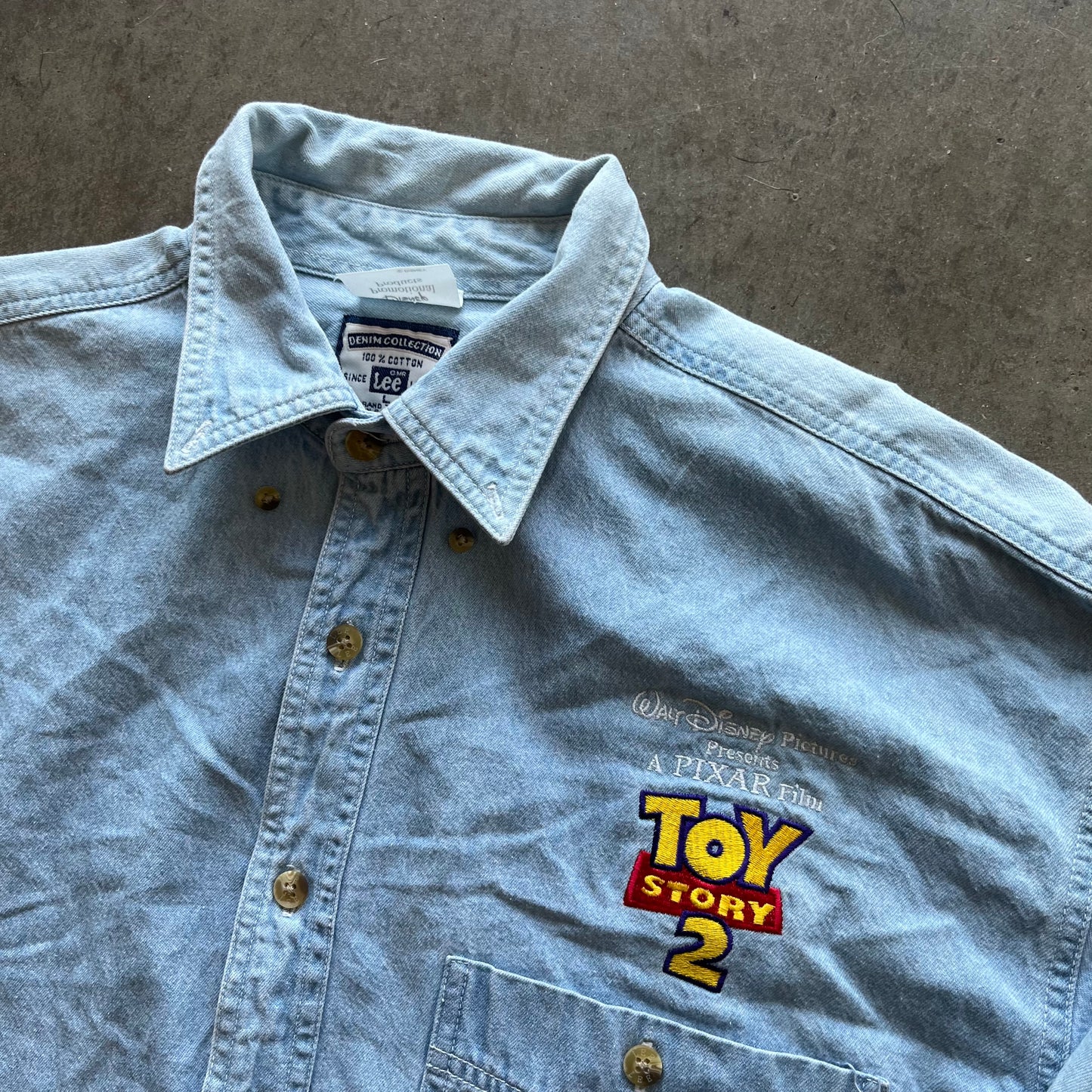 L 99 Toy Story 2 Button Up