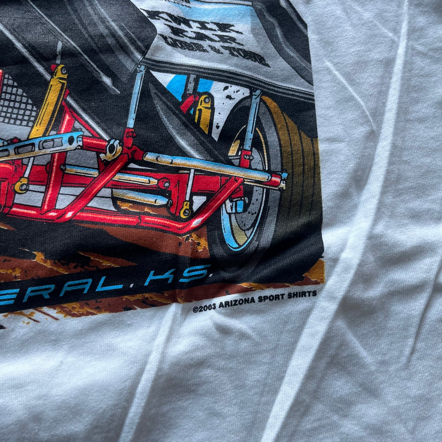 L 03 Tony Bruce Junior Tee