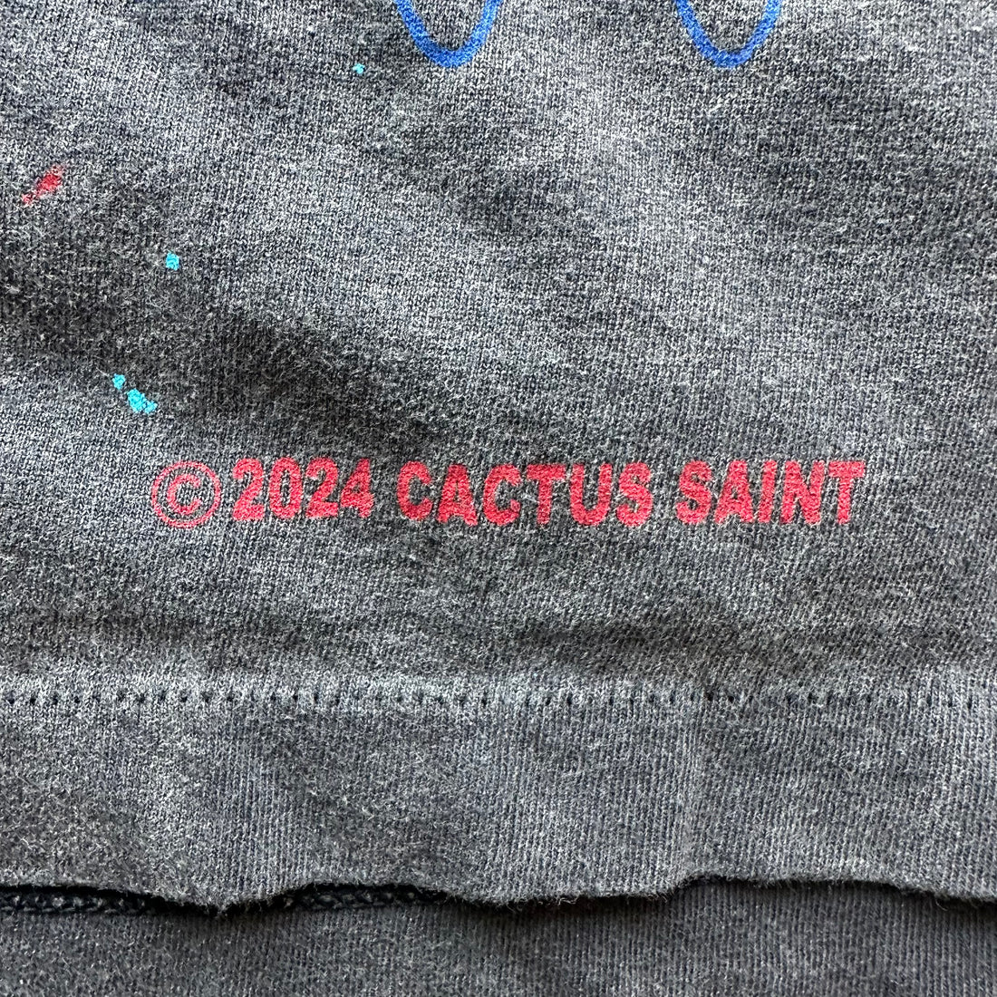 L Brand New Saint Angry God Tee